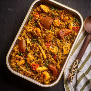 Iwuk edesi – palm oil jollof rice with assorted meat and shrimps